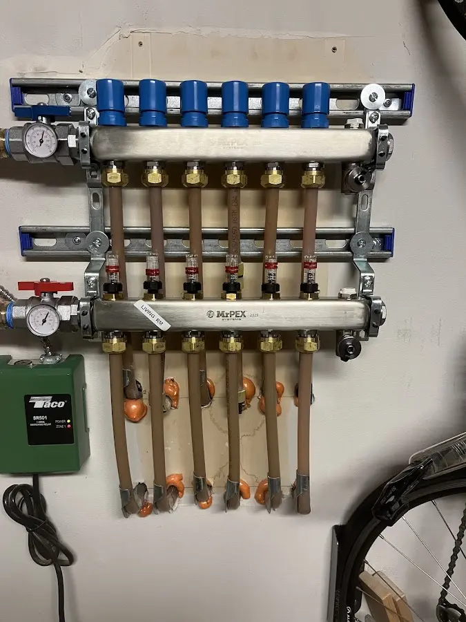 Plumber performing Water Heater Repair at a residential property in Emmett